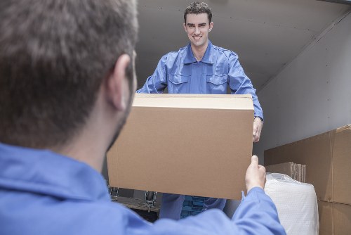Removal team sorting recyclable materials during a Knightsbridge move