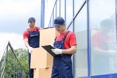 Professional furniture removals team working in a Knightsbridge townhouse