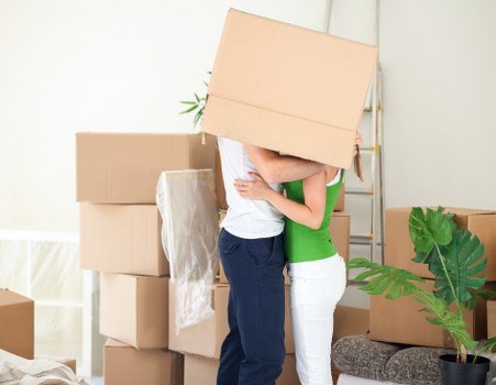 Movers handling items carefully during a scheduled relocation