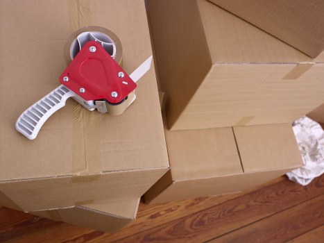 Movers handling furniture with care during a transport service