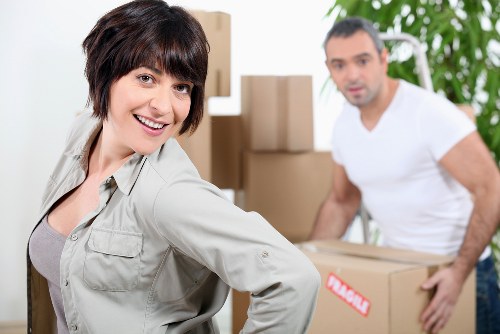 Professional movers packing fragile belongings in Knightsbridge