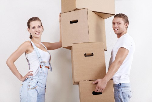 Professional office movers packing business equipment in Knightsbridge